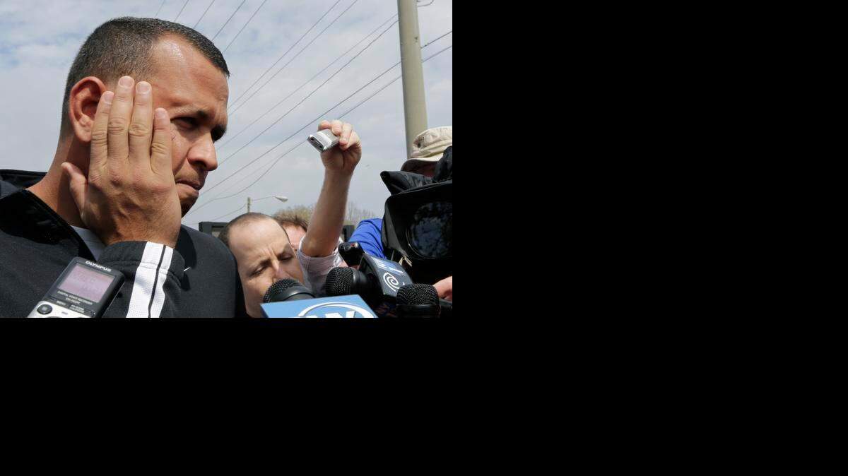 
New York Yankees infielder Alex Rodriguez talks with the media following a spring training workout in Tampa on Tuesday.
