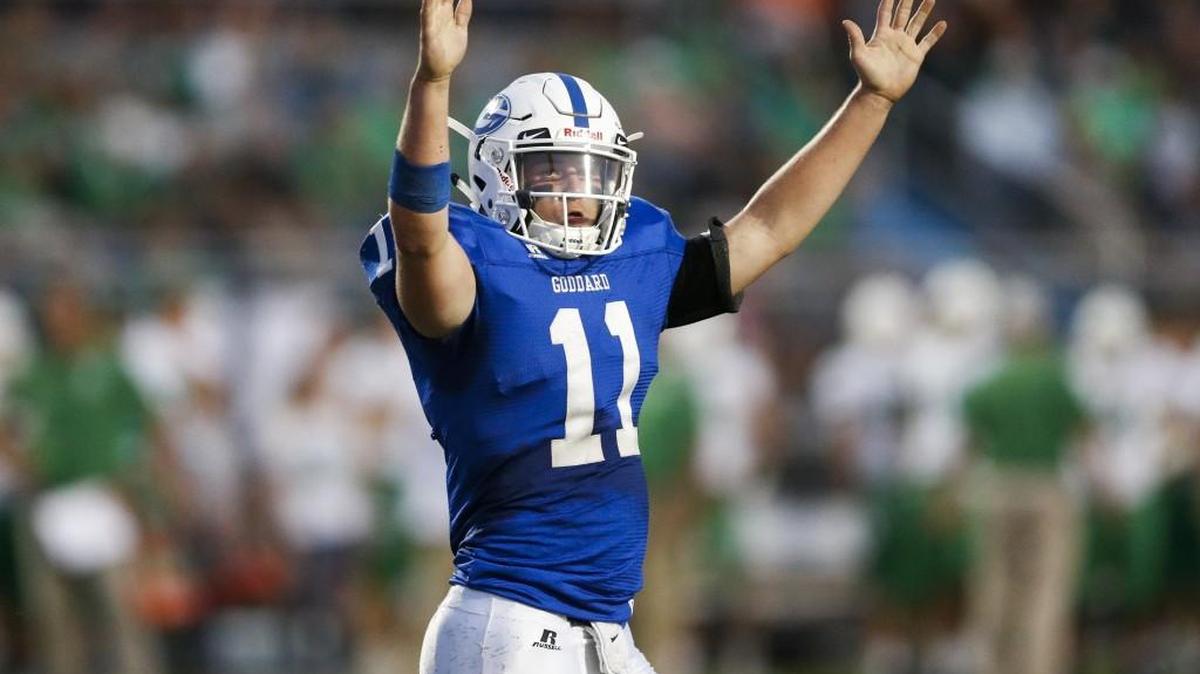 Goddard QB Blake Sullivan signals a touchdown during Week 2. The Lions (3-0) have taken over the top spot in Class 5A.