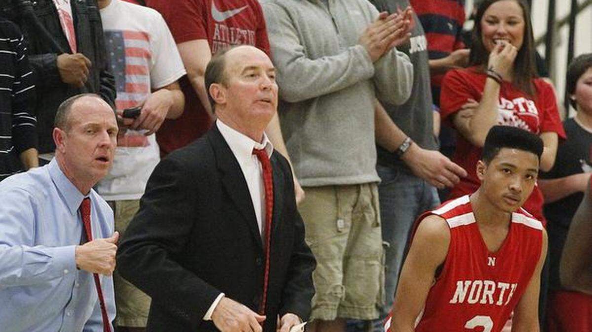 Gary Squires, former North boys basketball coach, directs his team during Redskins' 2013 City League championship season. North athletic director Mike Church announced Squires resignation Tuesday.