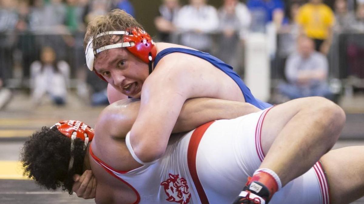South High's Kasdon Arehart defeated Evan Darville in overtime to win the 6A title at 285 pounds Saturday at Hartman Arena.