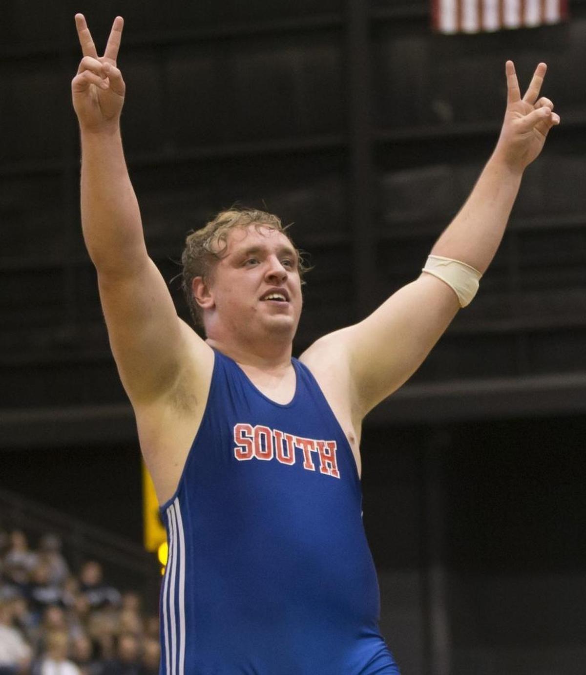 South High’s Kasdon Arehart celebrates his second state title Saturday.