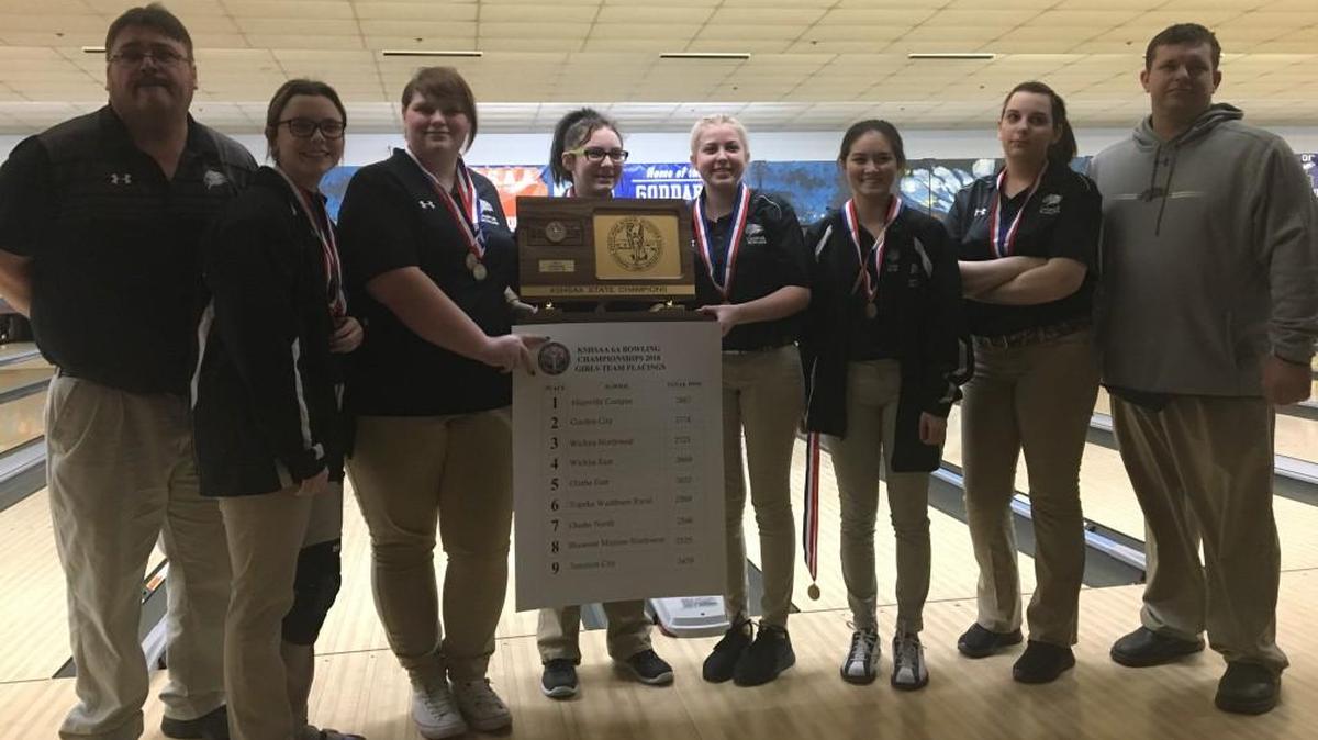 Campus girls bowling team and individual champion Piper Reams, second from left, stand with Class 6A championship trophy.