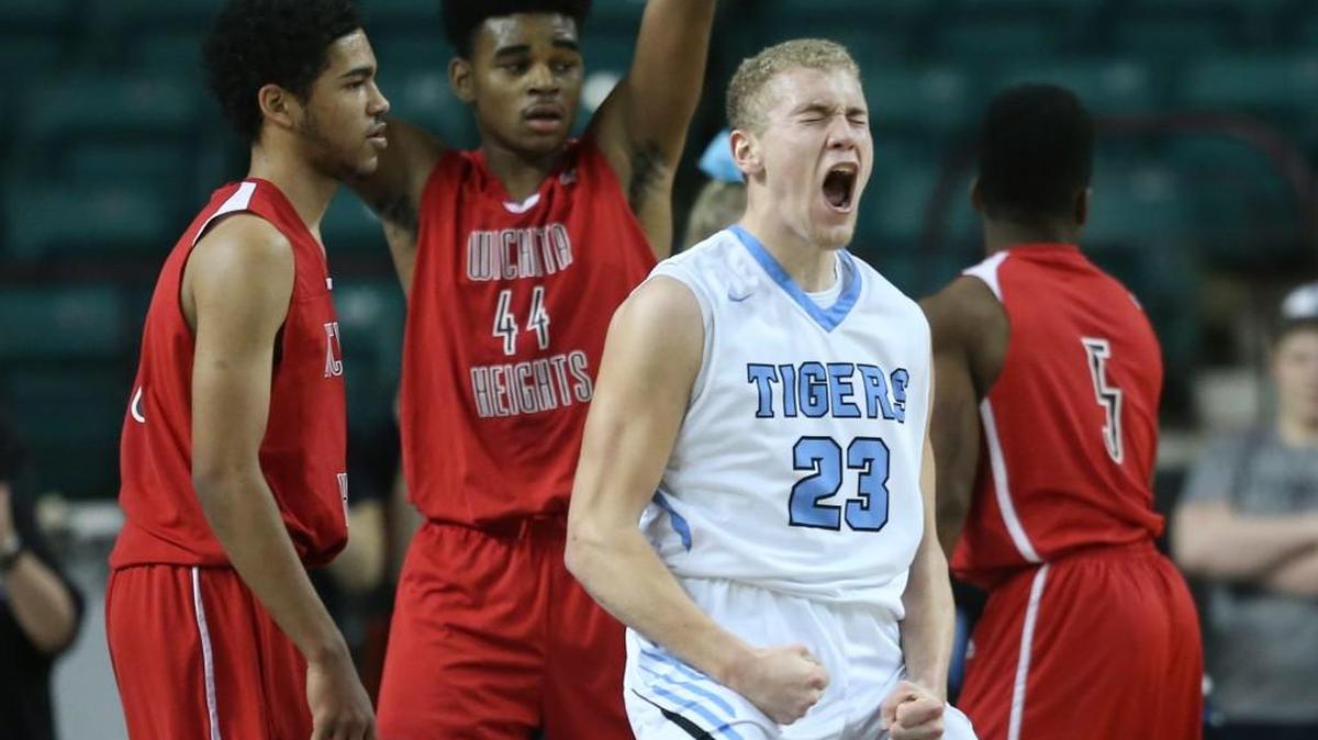 Eisenhower’s Tanner King celebrates during last season’s Class 5A tournament game against Heights.