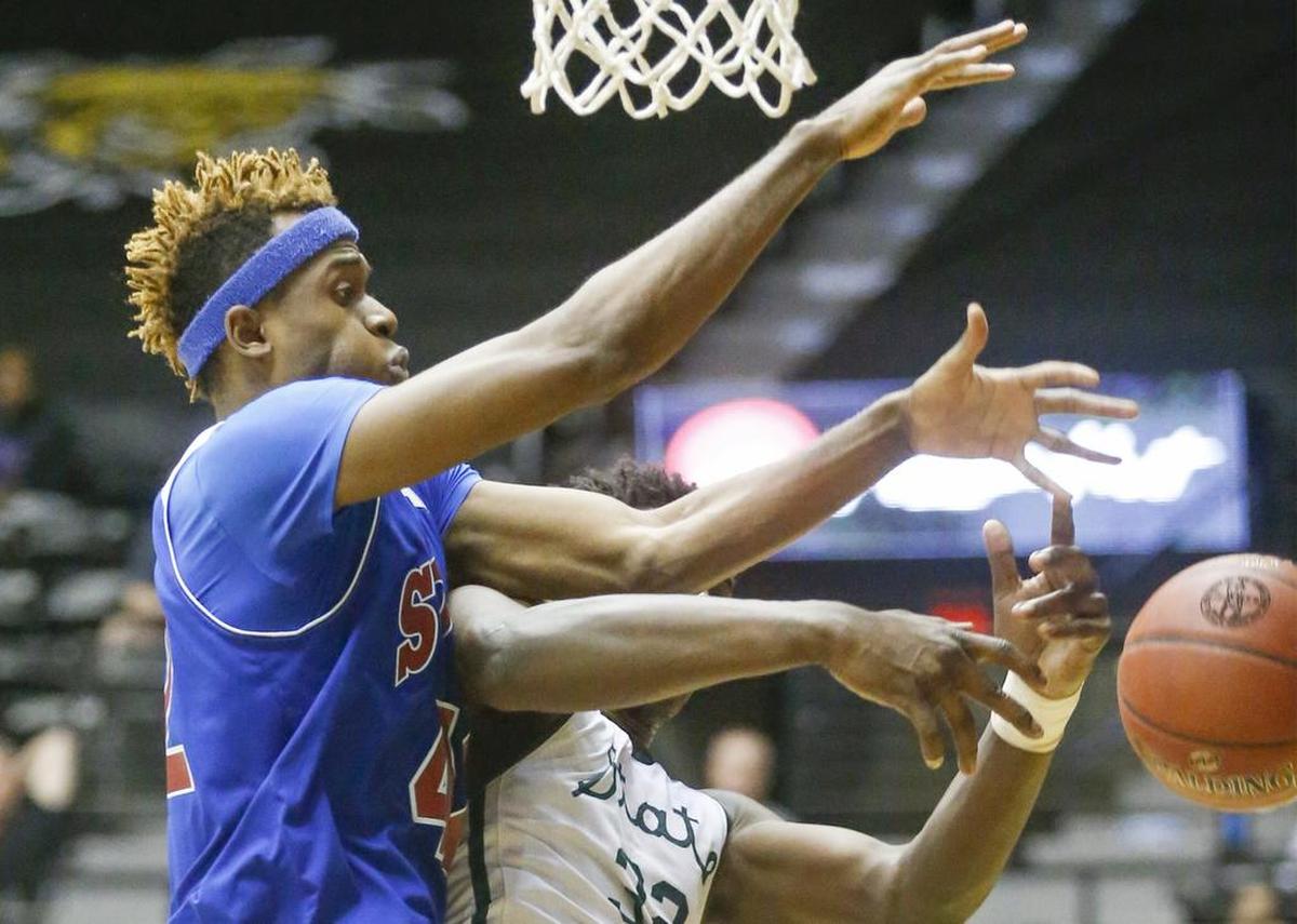 South's Remy Lemovou, left.