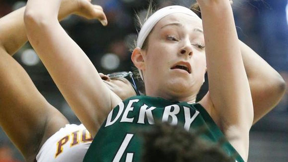 Derby's Kennedy Brown, center goes up high to rebound against West's Mikayla Shaw, left, and Dy'Mond McElrath in the fourth quarter of their 6A semifinal game last season.
