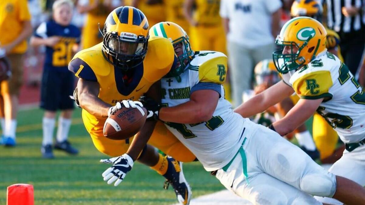 Northwest’s Breece Hall scores a touchdown last fall against Carroll.