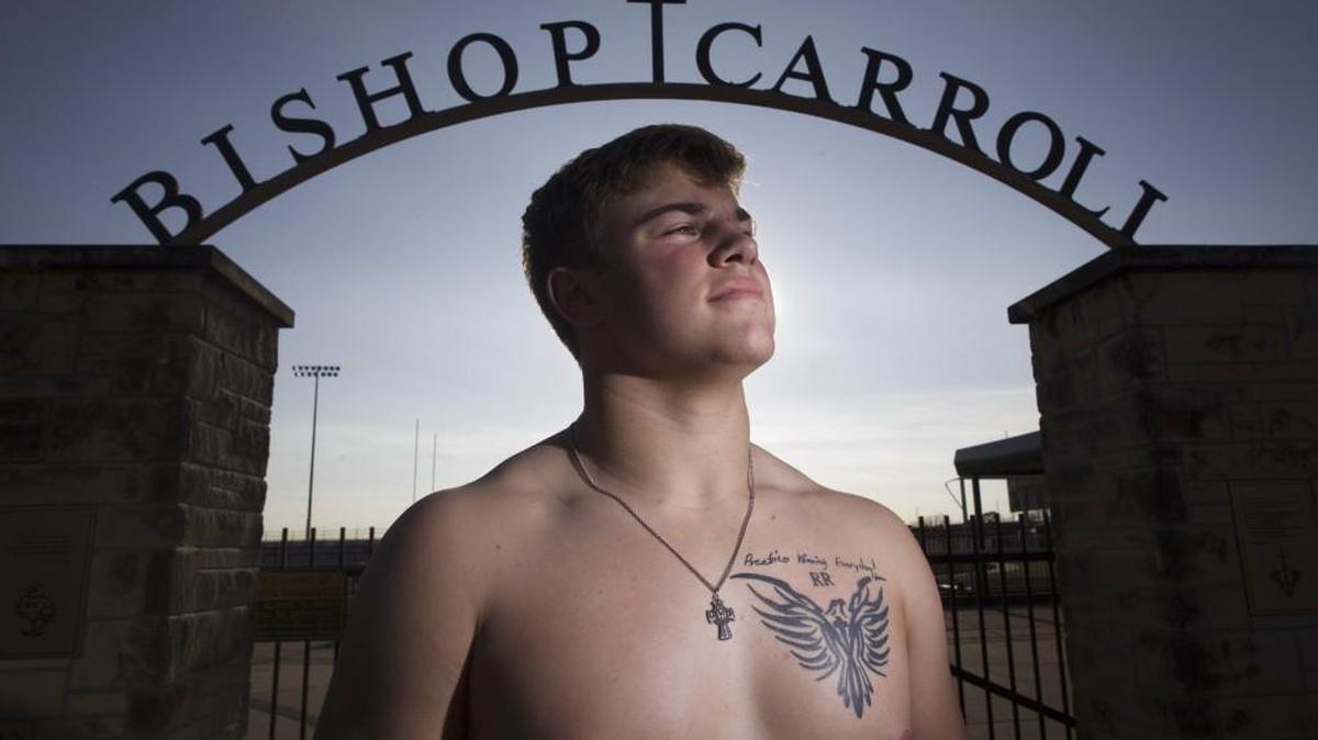 Bishop Carroll senior Riggs Robben lost his father two years ago when Roger Robben died following a jog. Riggs has a tattoo on his chest as a reminder of his father.