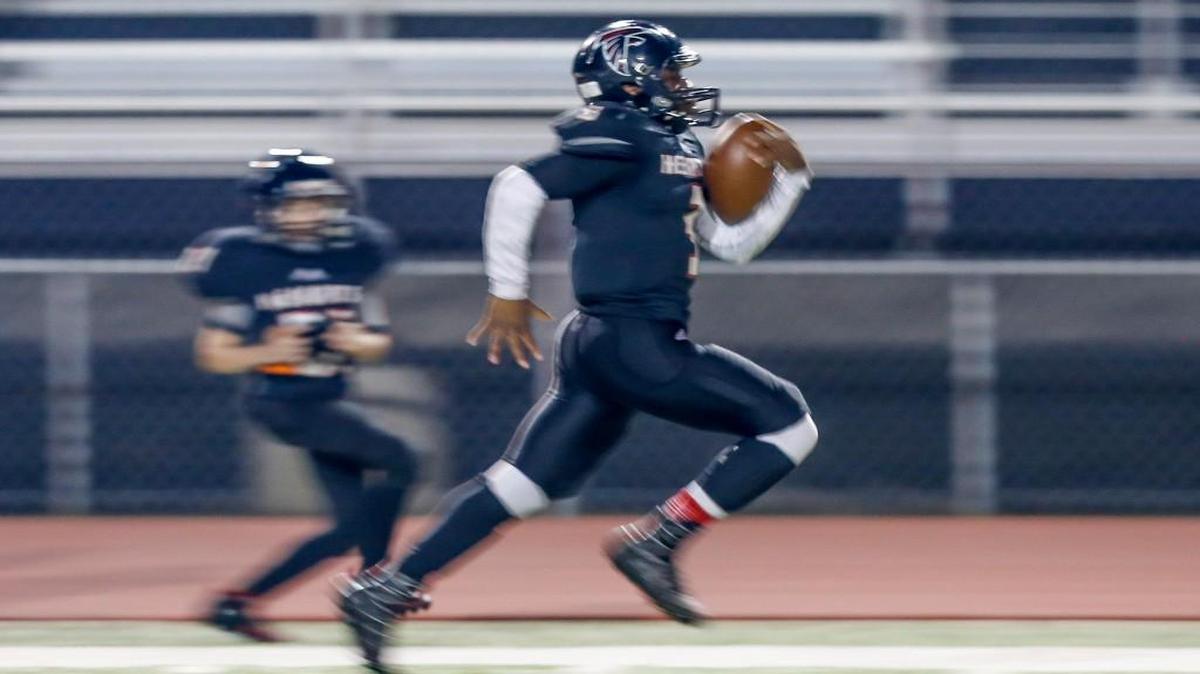 Heights quarterback K'Vonte Baker makes a long touchdown run last season. Baker scored eight TDs Friday night.