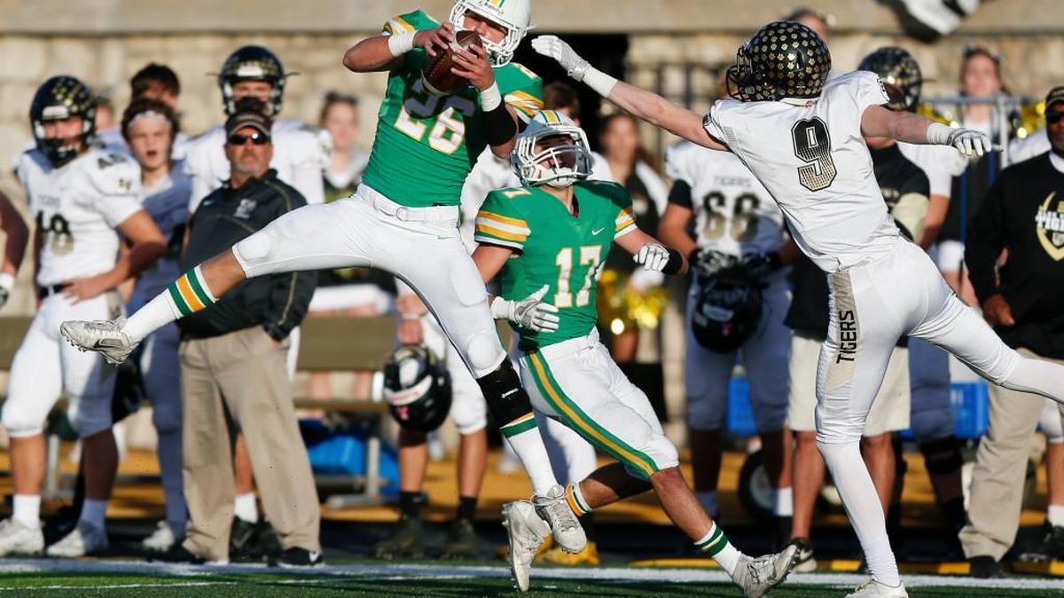 Derby's Tanner Igo comes up with an interception in last season’s Class 6A title game. Varsity Kansas wants coaches, players, and fans to send us video of the top plays of the 2017 season.
