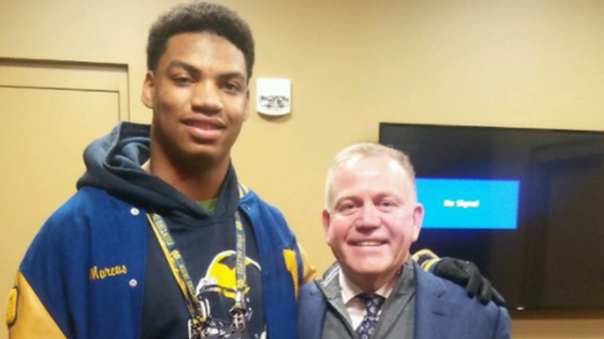 Northwest junior Marcus Hicks with Notre Dame head coach Brian Kelly.