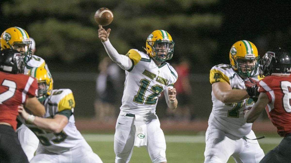 Carroll QB Braden Howell fires a pass against Heights in the second quarter Friday.