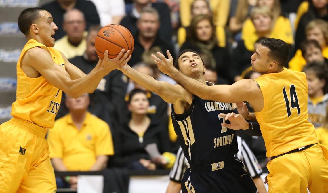 Wichita State’s Landry Shamet grabs a loose ball from Charleston Southern’s Aaron Wheeler. At right is Wichita State’s John Robert Simon. (November 13, 2015)