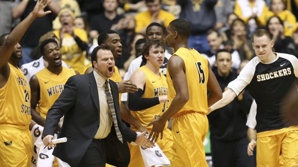 The Wichita State bench cheer for Anton Grady against New Mexico State at Koch Arena. (February 15, 2016)